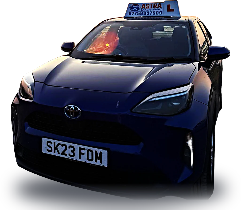 Astra Driving School tuition car with roof sign